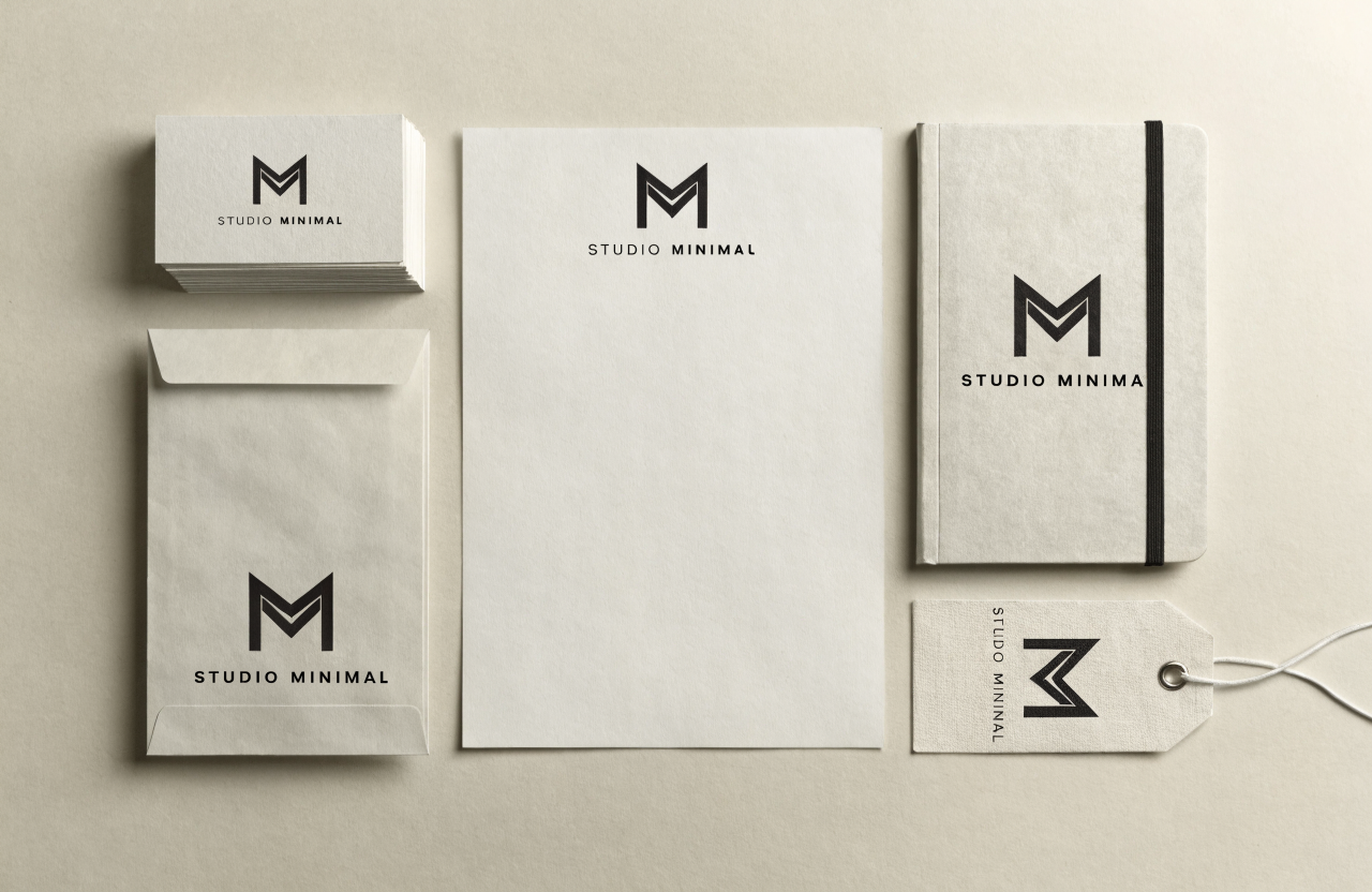 Concept full stationery suite flat lay with a minimalist monogram